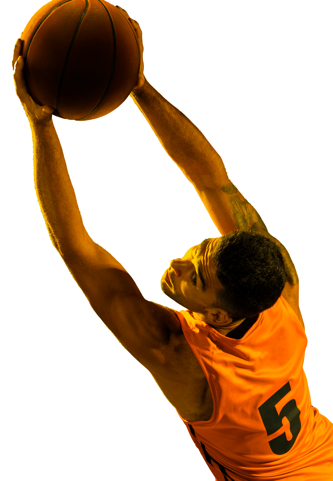 In the the picture there is a male basketball player extending his arms holding a ball. He is wearing an orange t-shirt with the number 5 written on his back.